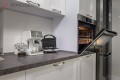 Bucătărie neoclasică în formă de „L” fronturi MDF frezat 3D - vopsit Alb NEO146 Bucătării Neoclasice la comanda chisinau