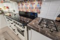 Bucătărie neoclasică cu insulă fronturi MDF frezat 3D - vopsit Fildeș NEO245 Bucătării Neoclasice mobila