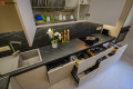 Bucătărie modernă în formă de „U” fronturi Acrylux Portocaliu MOD159 Bucătării moderne mobila