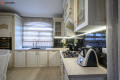 Bucătărie clasică în formă de „L” cu fațada MDF frezat 3D - vopsit Fildeș CLA337 Bucătării clasice mobila