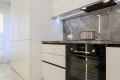 Bucătărie modernă liniară cu fațada Acrylux Alb MOD392 Bucătării moderne la comanda
