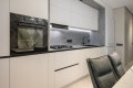 Bucătărie modernă liniară cu fațada MDF vopsit mat Alb MOD423 Bucătării moderne la comanda