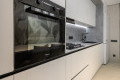 Bucătărie modernă liniară cu fațada MDF vopsit mat Alb MOD423 Bucătării moderne la comanda
