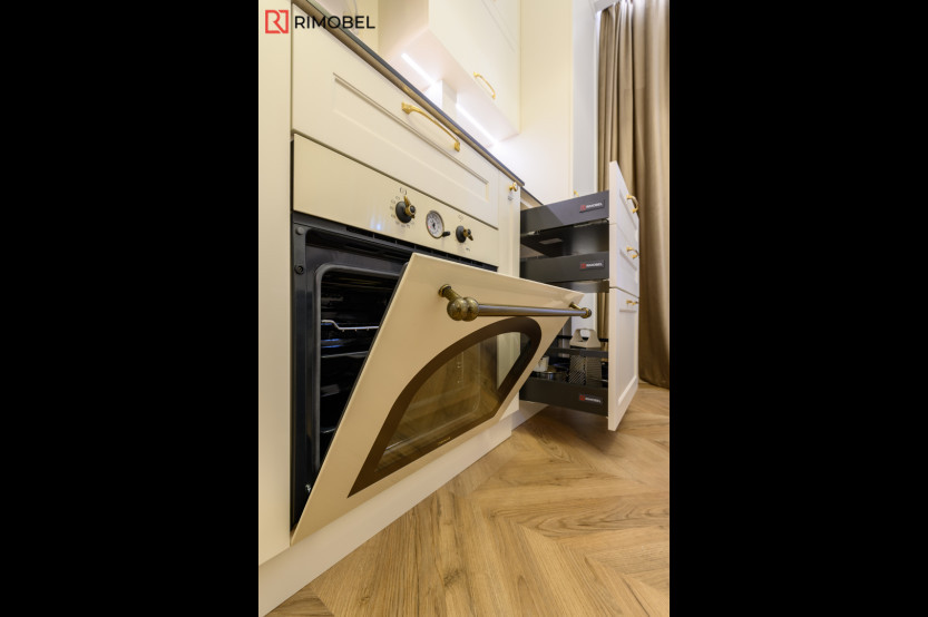 Bucătărie neoclasică în formă de „L” cu fațada MDF frezat 3D - vopsit Fildeș NEO380 Bucătării Neoclasice mobila